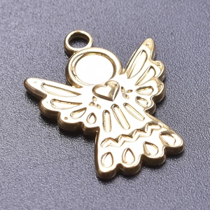 Macro shot of 18k gold plated stainless steel angel pendant with heart detail