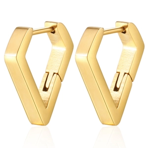 Close-up of gold geometric V-shaped earrings with polished finish on white background