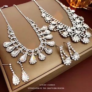 Luxurious silver-plated geometric teardrop necklace set with sparkling rhinestones