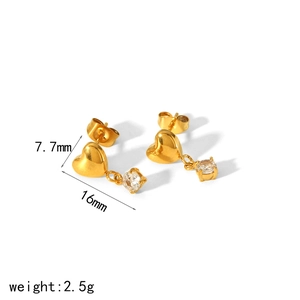 Macro view of 18k gold heart earrings with zircon pendant showing 16mm length detail