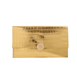 Elegant gold crocodile texture envelope clutch bag with a metallic finish and round buckle