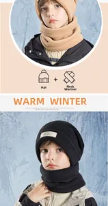 Close-up of thick fleece kids winter hat and scarf set with warm ear protection