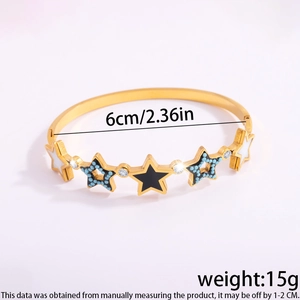 Macro shot showing 6cm inner diameter and 15g weight of gold Evil Eye star bracelet