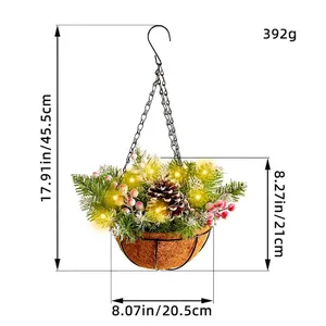 Hanging Christmas basket with pine cones, needles, and warm LED lights on white background