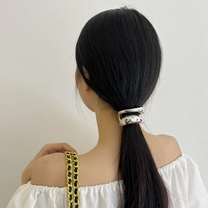 Minimalist double-layered silver metal hair ring accessory for sleek low ponytail