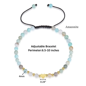 Detail view of 4mm Amazonite bead bracelet with gold heart charm and adjustable cord