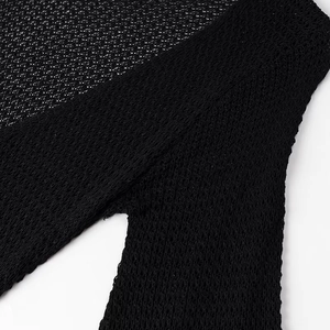 Close-up of black mesh crochet fabric texture showing fine knitted openwork details