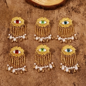 Retro evil eye earrings with gold fringe and pearl drops in various colors