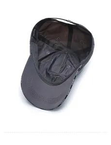 Interior view of grey cotton baseball cap with sports ribbon and 100% cotton label