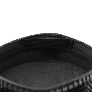 Close-up of black sequined captain hat interior with adjustable elastic band and mesh lining