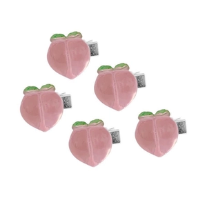 Set of five cute pink peach hair clips with metal duckbill base on white background