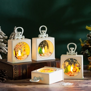 Christmas LED lantern with festive scenes and warm light in a white gift box design