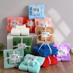 Soft coral fleece towel and bath towel set displayed in multiple vibrant colors