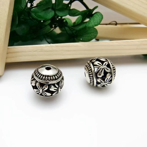 Silver retro hollow alloy beads with floral and butterfly patterns for jewelry making