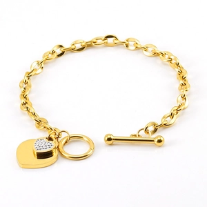 Vintage gold double heart charm bracelet with crystal pavé and OT toggle clasp
