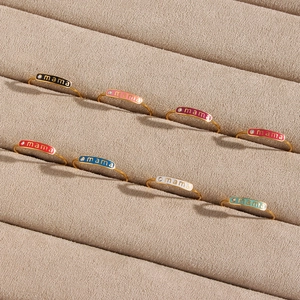 Set of 8 adjustable 18K gold-plated stainless steel mama rings in various enamel colors