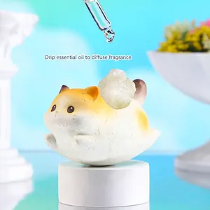 Cute hamster essential oil diffuser stone with crystal on blue and white background