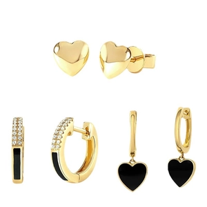 Golden earring set featuring black heart enamel charms and sparkling zircon accents