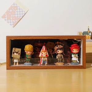 Hirono figure collection displayed in a premium walnut wood LED lightbox frame