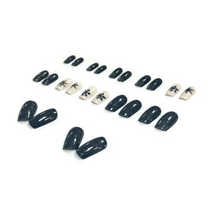Navy blue glitter and white snowflake pattern press-on nails set with 24 gloss pieces