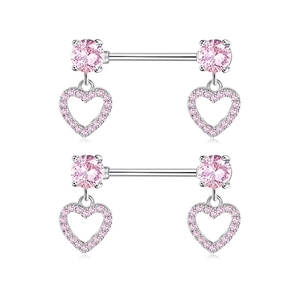 Macro detail of butterfly nipple rings with pink heart zircons on stainless steel barbells