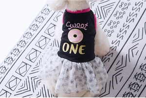 Detail of a dog tutu dress with Sweet ONE print and three-layer mesh star pattern