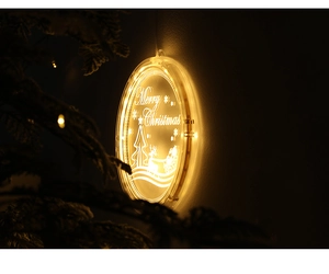 Detail of warm white LED acrylic Christmas hanging light with Merry Christmas reindeer design