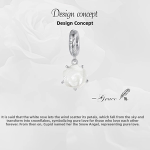 Macro view of a 925 sterling silver white rose charm pendant with carved vine ring