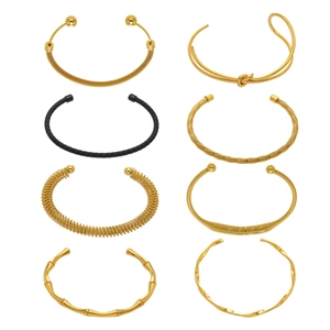 Set of 8 minimalist stainless steel bamboo joint and twisted open bangles in gold and black