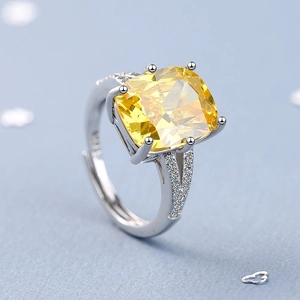 Elegant silver open ring with large yellow square zircon and side diamond accents