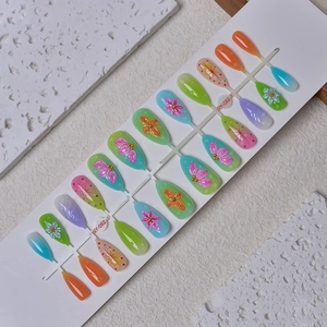 Candy gradient press-on nails with 3D floral reliefs and pearls in almond shape