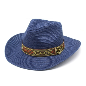 Detailed close-up of dark blue woven straw hat with bohemian patterned decorative band