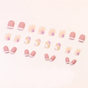 Matte floral press-on nails with pink French tips and purple flower art, 24 piece set