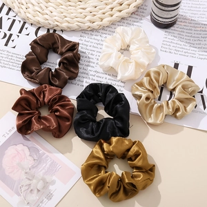 Elegant set of six satin silk scrunchies in earthy tones for hair styling