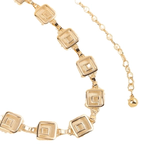 Gold metal waist chain featuring square embossed links and polished spherical pendant