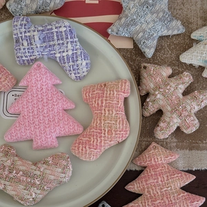 Handmade tweed Christmas tree and stocking ornaments on a ceramic plate for DIY decor