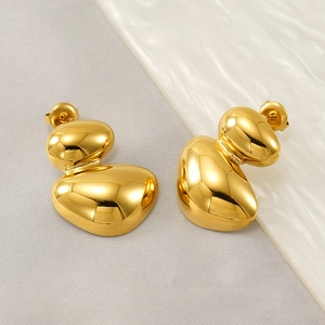Modern gold irregular pebble stud earrings with polished finish and layered minimalist design