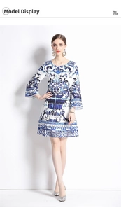 Blue and white porcelain print dress featuring elegant crew neck and flared split sleeves