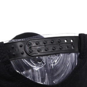 Detail of adjustable snapback closure on black baseball cap with durable plastic strap