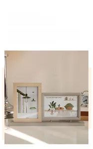 Dual-frame Nordic photo display with 4x6 inch wooden frames and textured finish