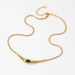 Minimalist gold snake chain necklace with a streamlined pendant and green natural stone