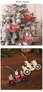 Detail of Christmas wooden ornaments featuring Santa and deer riding bicycles on a pine tree