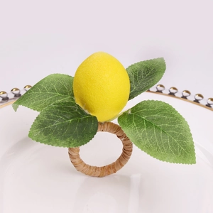 Realistic lemon napkin ring with woven straw base and green leaves on white plate