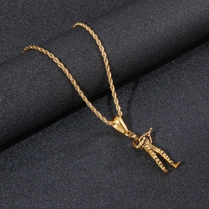 Detail of creative golden soldier shooting pendant on a stylish twisted rope chain
