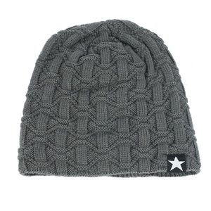 Close-up of dark grey knit beanie featuring a star patch and textured ribbed pattern