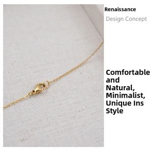 Macro shot of gold lobster clasp on titanium steel necklace with elegant metallic luster