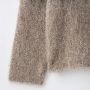 Retro brown mohair knit sweater with soft fluffy texture and loose crewneck fit