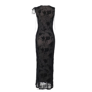 Detail of floral flocking mesh fabric and back cut on this black sleeveless maxi dress
