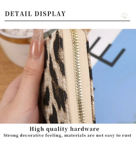 Detail display of leopard print card wallet with high-quality gold metal zipper hardware