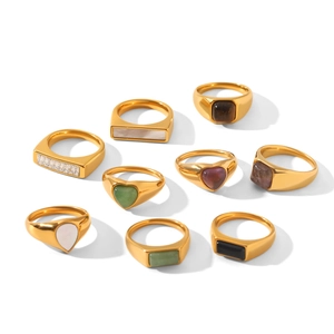 Set of gold-plated stainless steel rings with colorful natural stones in heart and drop shapes